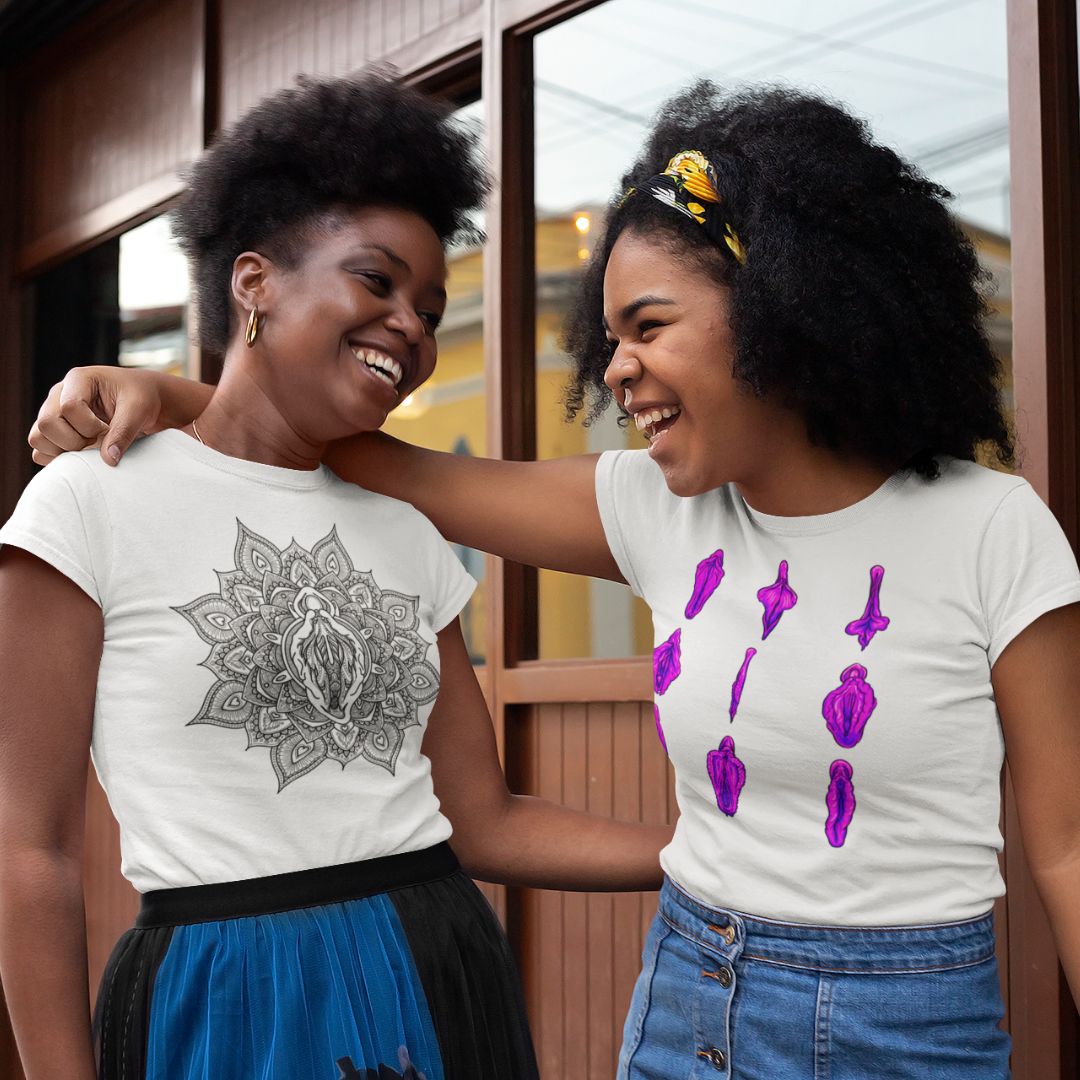 A photo of two people wearing vulva shirts and laughing together.